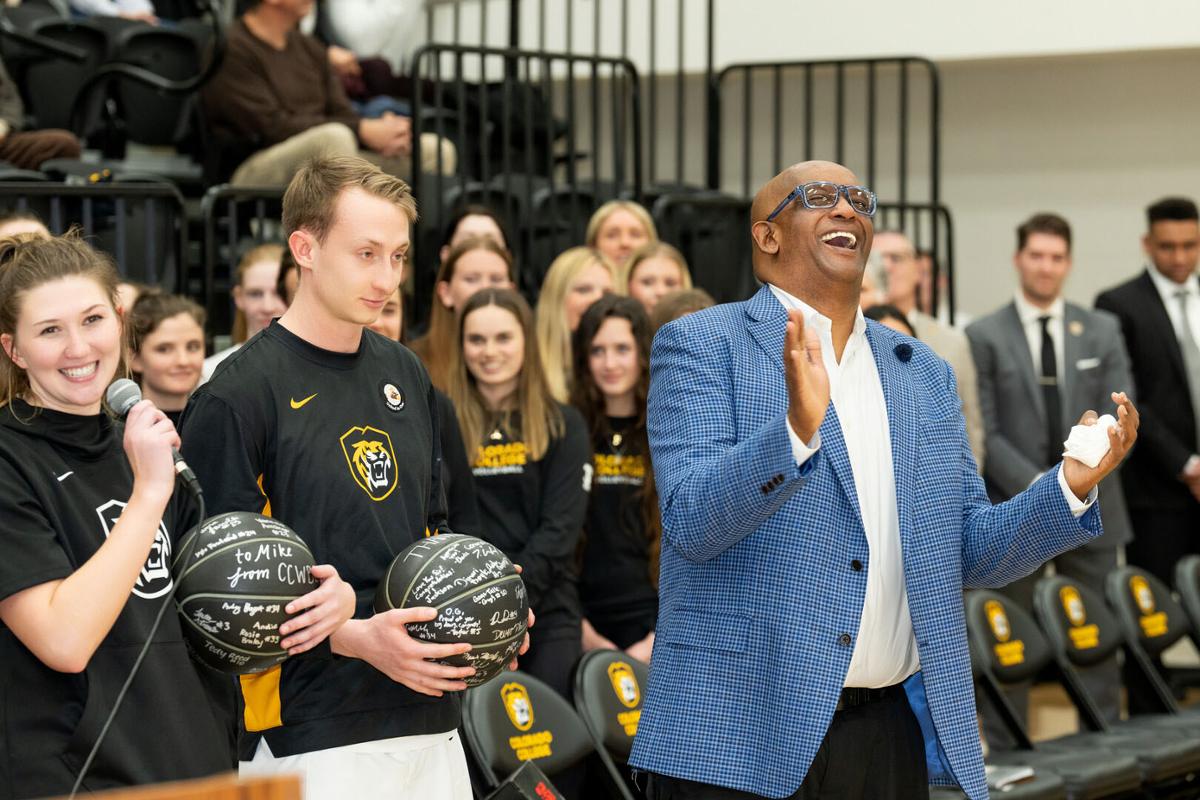 Mike Edmonds received gift basketballs from the women’s and men’s basketball teams during the Inasmuch Foundation Basketball Court Dedication at Reid Arena in honor of Mike Edmonds on 2/17/23. Photo by Lonnie Timmons III / Colorado College.